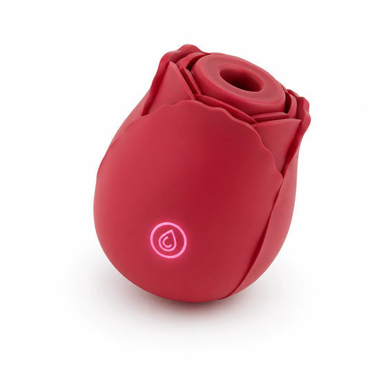 Angled red rose vibrator showing flower-shaped top and front button