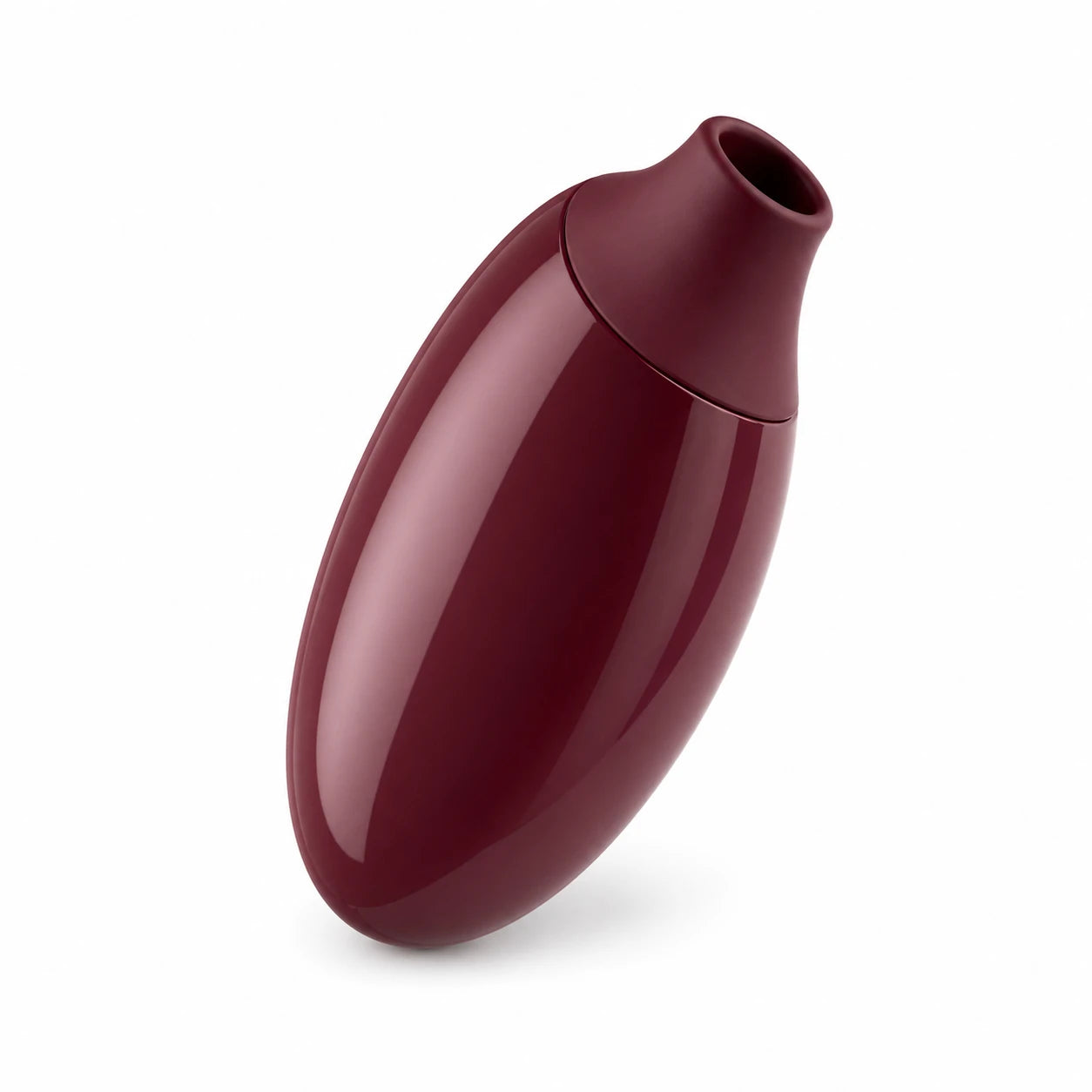 Angled burgundy suction vibrator showing compact oval body and soft top opening
